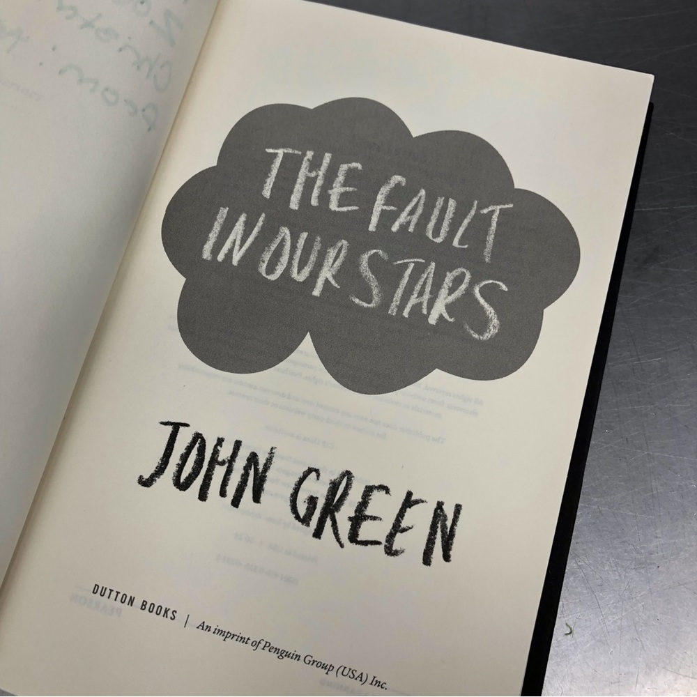 The Fault in Our Stars by: John Green, Hardcover book